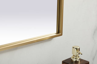 Metal Frame Arch Mirror 39x24 Inch in Brass