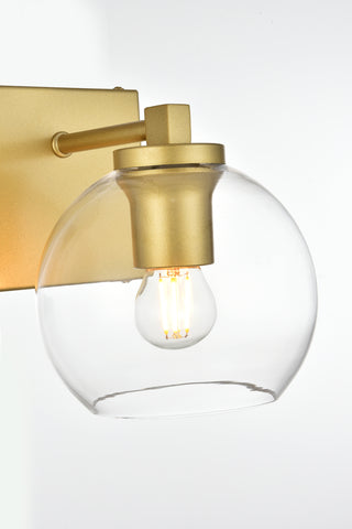 Juelz 1 light Brass and Clear Bath Sconce