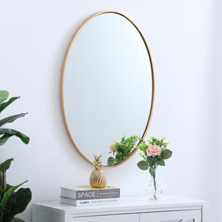 Metal frame oval mirror 34 inch in Brass