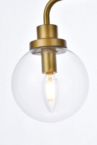 Hanson 2 lights bath sconce in brass with clear shade