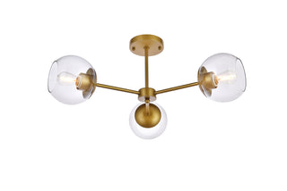 Briggs 26 inch flush mount in brass with clear shade