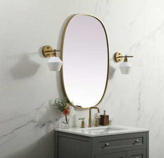 Metal Frame Oval Mirror 27x40 Inch in Brass