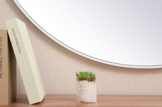 Metal frame round mirror with decorative hook 45 inch in White