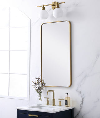 Soft corner metal rectangular mirror 20x36 inch in Brass