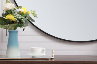 Metal frame round mirror with decorative hook 39 inch in Black